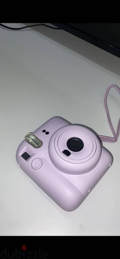 Instant camera 12 used with a 10 packs film
