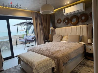 Furnished apartment for rent with a roof terrace, located in Rehana Residence compound; features high-end, "super-lux" finishes.