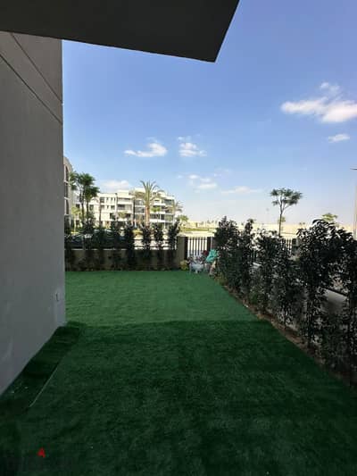 Ground apartment for rent in VYE Sodic Zayed compound – includes kitchen, air conditioning units, and appliances.
