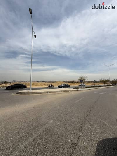 فرصه للاستثمار أرض للبيع 2,5فدان في الحزام الاخضر أمام نادي الفروسية بالشيخ زايد