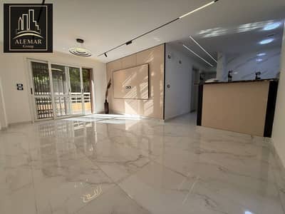 For sale in Madinaty, ground floor with garden, special finishes, 97m² + 50m² garden in B6, wide garden view, next to services