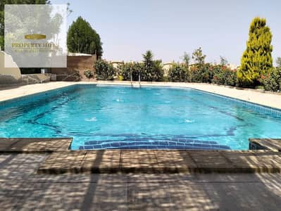 **Luxury Villa for Sale with a Stunning American-Style Design | Prime Location Near Mivida & Palm Hills**