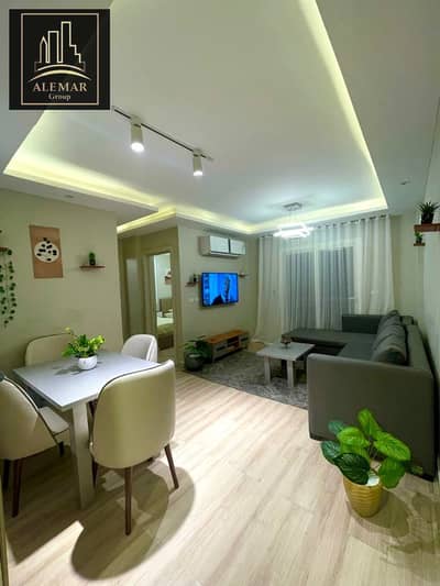 Distinctive apartment for sale in Madinaty, B12. Area: 78 sqm. Garden view. Second floor. Fully customized, high-end finishes. The sale includes the k