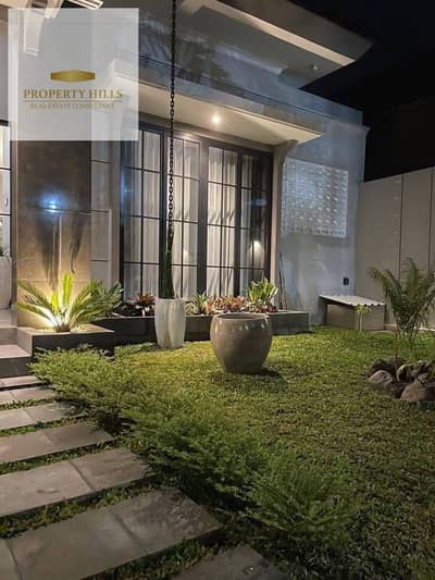 The largest corner villa for sale at a 54% discount in front of Madinaty on the Suez Road