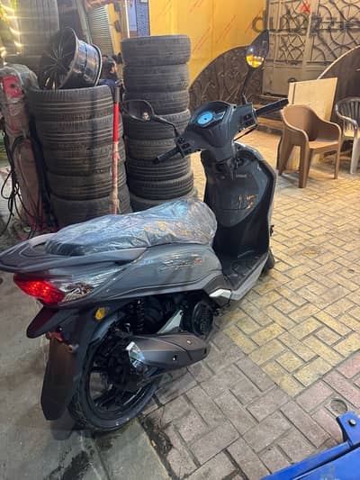 سكوتر sym st