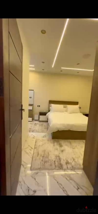 Furnished apartment for rent in One Kattameya compound; features hotel-style furnishings and has never been lived in.