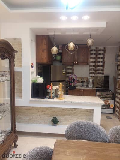 Furnished apartment for rent in a prestigious location in the Seryat Katameya compound on the ring road directly in front of the One Katameya compound