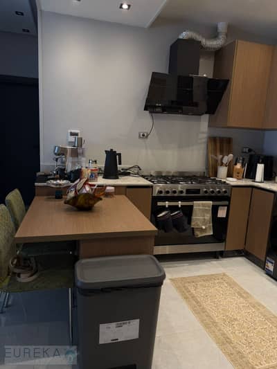Apartment for sale 120sqm + 40sqm garden in El Patio Oro New Cairo. Ground floor, 2 beds, finished with ACs, ready to move, 9.5M cash. Contact us.