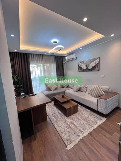 Furnished apartment for rent in Madinaty, two bedrooms, private finishes, in B12, in front of East Hub Mall and Kraft Zone