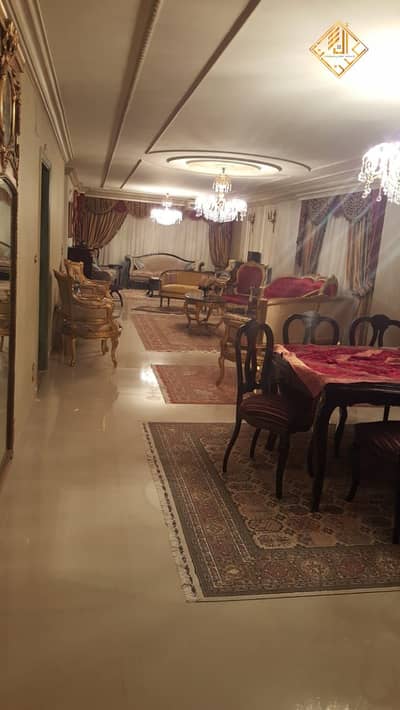Super-lux apartment for sale, fully furnished, in a prime location in Mohandessin.