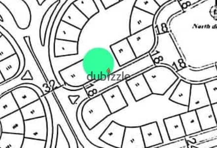 A prime plot of land in the new October neighborhoods, next to Badya, 800 Feddans, and the Wahat Road.