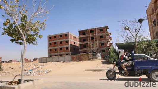 A piece of land for sale in New October, north of the airport, series 1
