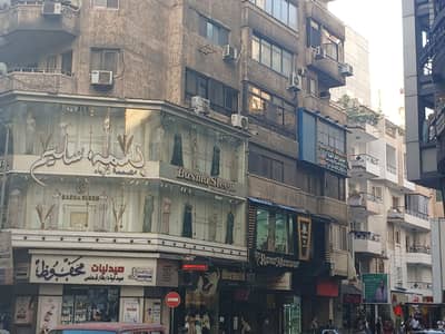 محل للايجار فى اللوران على الترام امام شارع شعراوي في موقع تجاري