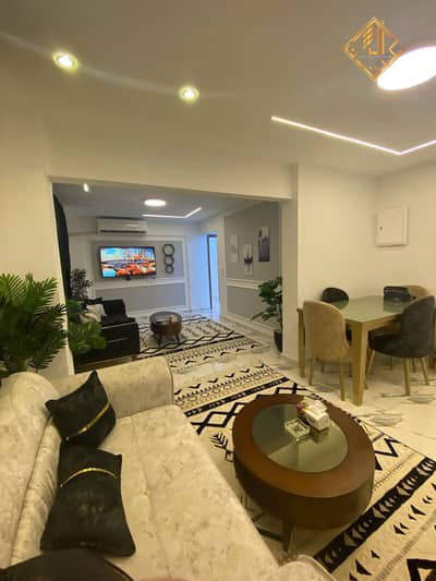 Apartment for sale, finished to a high standard ("super luxe"), fully furnished, in a prime location in Mohandessin.