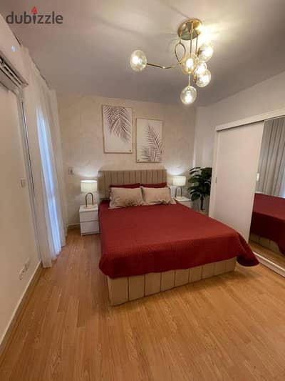 85-square-meter furnished hotel-style apartment for rent in B12, Madinaty. Features high-end finishes and hotel-quality furnishings. Located close to