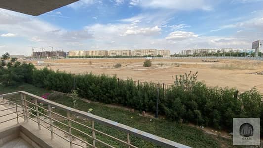 Apartment for rent in Dar Misr, Al-Andalus (Phase 2), with a garden view.