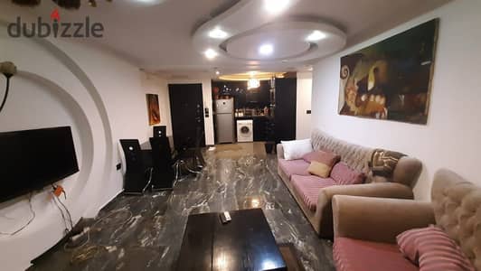 Furnished apartment for rent in Al Rehab City, prime location near the food court and services.