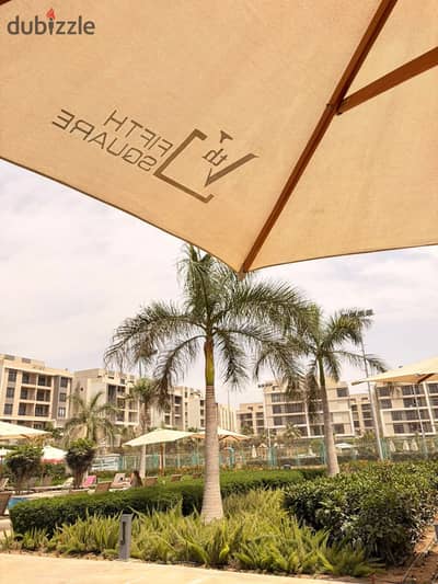 Apartment with a garden for sale, ready for immediate handover, located in the Fifth Settlement—near the American University in Cairo (AUC) and Cairo