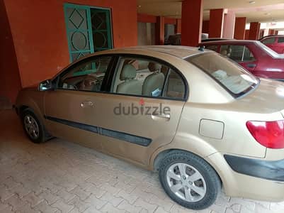 كيا ريو 2006 خليجي فابريكة بره وجوه