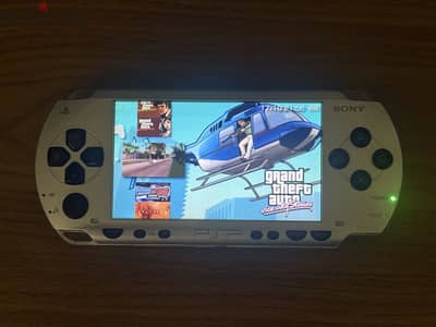 جهاز PSP Fat كارت ميموري 16 جيجا مليان العاب و برامج و افلام