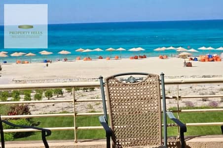 At the old price, a fully finished two-story standalone villa directly on the sea with a sea view, in one of the best locations on the North Coast, near SwanLake Hassan Allam, Fouka Bay, Mountain View, and La Vista.