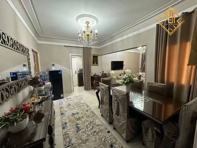 Apartment for sale, finished to a high standard ("super luxe"), fully furnished and equipped with appliances, in a prime location in Mohandessin.