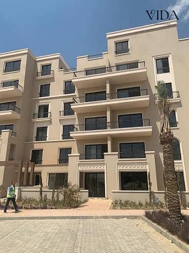 175 sqm resale apartment for sale in Village West (by Dorra), Sheikh Zayed. The unit is fully finished, includes air conditioning, and boasts a prime,