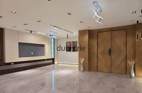 Apartment for sale, ready for immediate handover, with "ultra-super-lux" finishing, located in the Garden City compound.