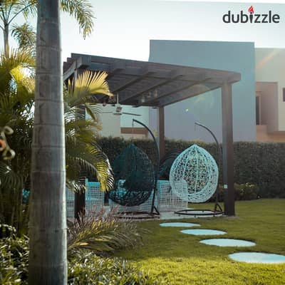 Villa with a Large Private Garden Ready to move  in a Prime Location  front Nile University, Sheikh Zayed, at JOYA.