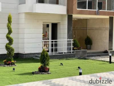 Ground floor apartment with garden for sale, immediate delivery in the Administrative Capital R7