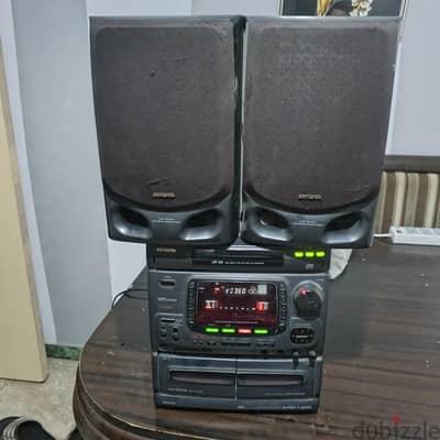 كاسيت بيشغل راديو + اسطوانات + شرايط و 2 سماعات