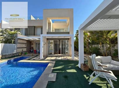 شاليه للبيع استلام فوري بفيو بحر وروف خاص فاخر في Hacienda White الساحل الشمالي