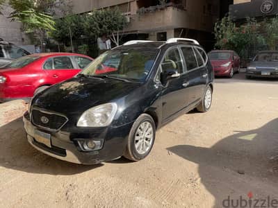 Kia Carens 2013 بحالة ممتازة عداد 125 الف هاي لاين