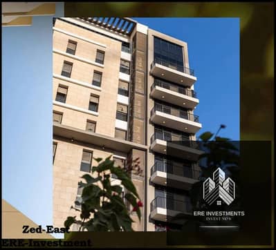 شقة للبيع متشطبة بالكامل بالتكيفات بموقع متميز جدا في كمبوند زد ايست التجمع السادس Zed East New Cairo