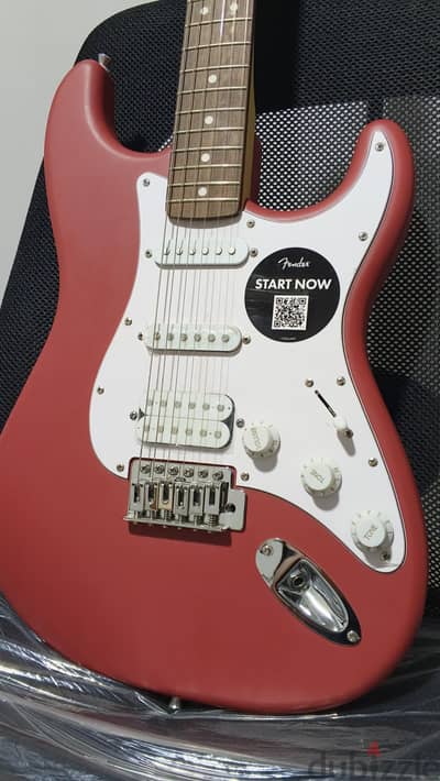 Squier Stratocaster guitar by Fender + Fender Frontman 10G amplifier