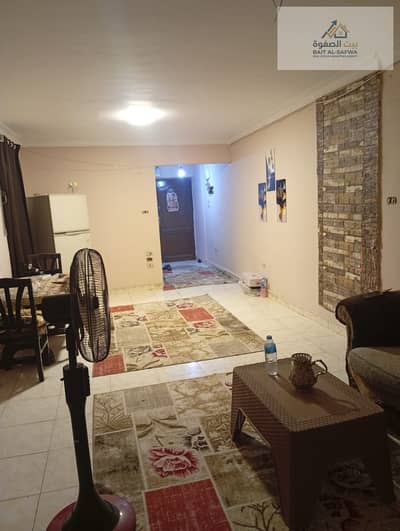 Furnished apartment for rent, new Awqaf Buildings, Arab Al-Maadi, air-conditioned, room with ground internet