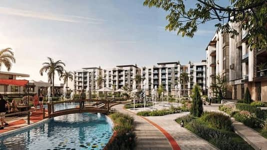 115 sqm 2-bedroom apartment for sale in One District compound, Sheikh Zayed—located opposite Al Rabwa. Available with 0% down payment