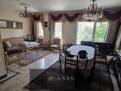 Apartment for sale, 137 sqm, in Al-Karma Residence. Located on the first floor with a view of the landscaped grounds. Features include Indian marble f