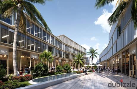 محل للبيع دور ارضي علي البلازا مباشر علي محور البوليفارد باداره وتشغيل شركه Savills بمقدم 5%