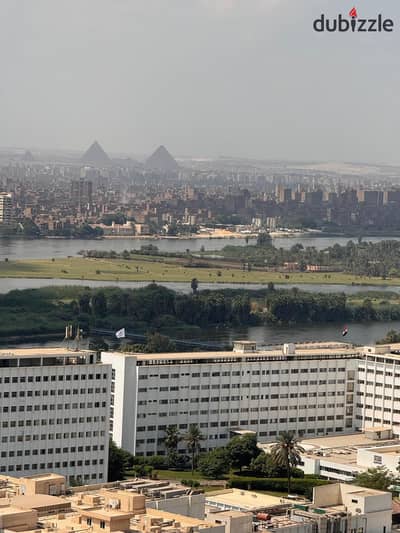 Maadi Corniche Apartment for Sale 3 Rooms Direct View of the Nile+Pyramids+Armed Forces Hospital Area 180 m inside Osman Towers for Quick Sale for Travel Purpose Price Shot