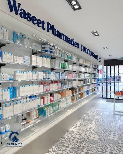 Pharmacy for sale on Hasan Mohamed Street branching from Al-Haram Street and King Faisal Street