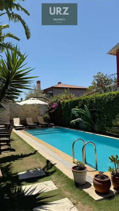 Standalone villa with private pool for Sale in installments over 12 years with a special discount in Butterfly on the Suez Road opposite Al Shorouk an