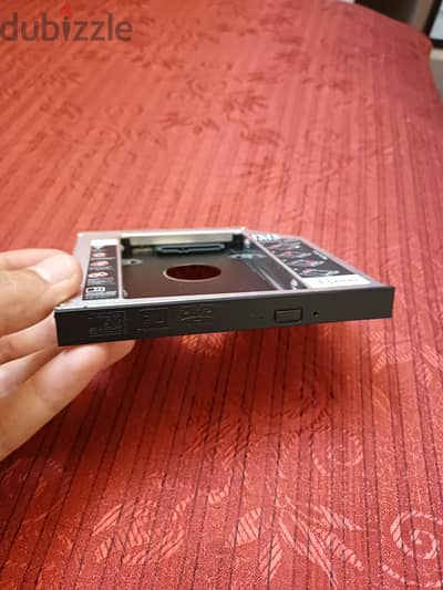 SSD Caddy تركب مكان السى دى فى لابت  توب لتشغيل هارد اضافى فى الاب توب