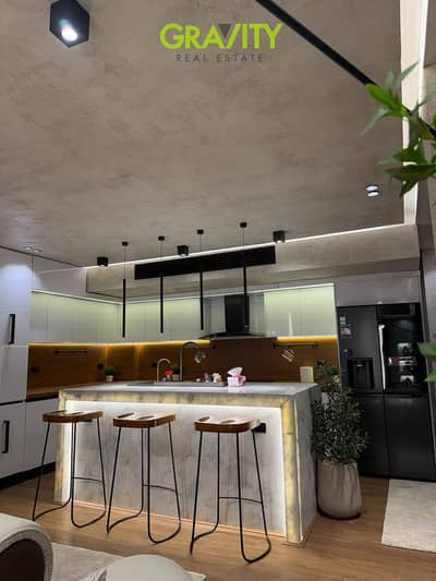 Apartment for sale next to the AUC | 2.5% down payment and an 8-year installment plan; located just minutes from Waterway East, Madinaty, and Al Rehab
