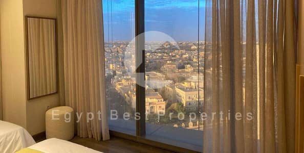 Own an apartment in ZED West by ORA, 3 bedrooms, ready for immediate occupancy, spacious, fully finished, with air conditioning and a fully equipped k