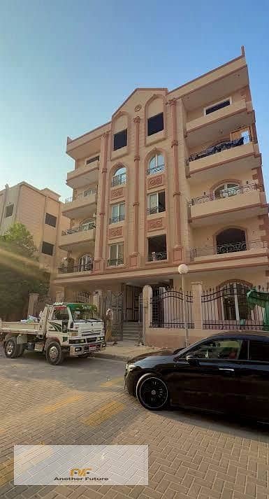 Apartment for sale in Al-Kanaria compound in Sheikh Zayed, located directly in front of HyperOne.