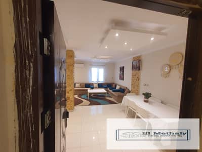 90-square-meter apartment for sale on the second floor, fully furnished and equipped with appliances; located near amenities and Mall 1.