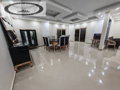 Apartment with a kitchen for rent in Al-Banafseg, New Cairo (Tagamoa) — located near the Chillout gas station and Sadat Axis. Garden view. Ultra-super