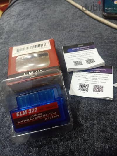 هذا الجهاز هو جهاز كشف أعطال السيارات (ELM 327 Mini OBD II Scanner).