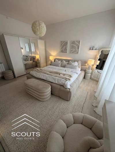 استلام فورى شقة للبيع Fully Finished بالتكييفات فيو مساحات خضرا و البرج الايقونى فى New Garden City جاردن سيتي R5 العاصمة الإدارية الجديدة